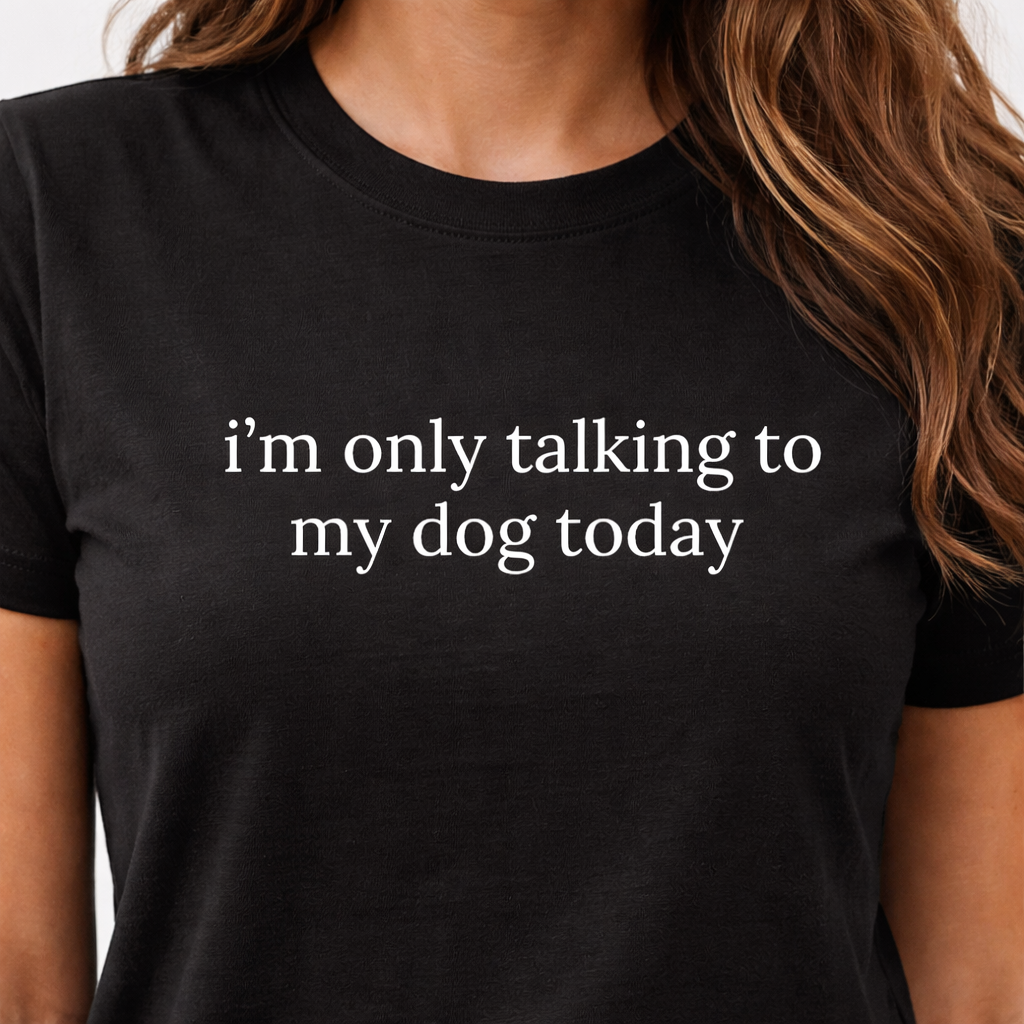 I am only talking to my dog white writing on black shirt on girl